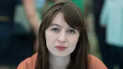 Sally Rooney claims she is unable to visit the UK over legal concerns